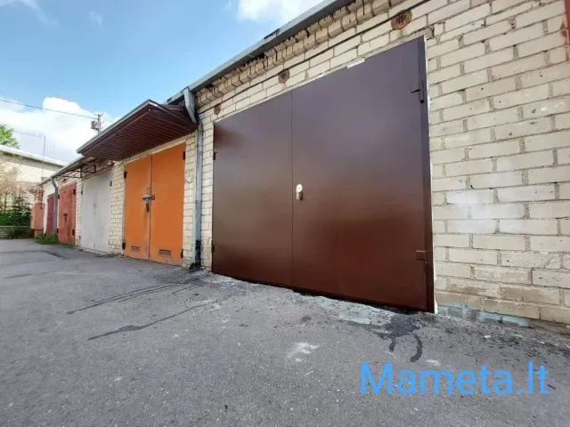 metaliniai, atveriami garažo vartai