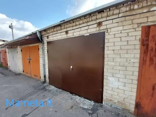 metaliniai, atveriami garažo vartai